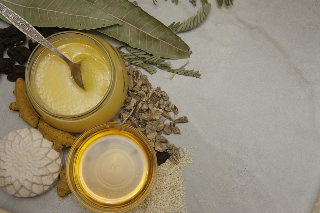 10 Natural and effective ways to gain weight fast in 2025 A top-view of natural ingredients including honey, herbs, and leaves, perfect for healthy lifestyle themes.